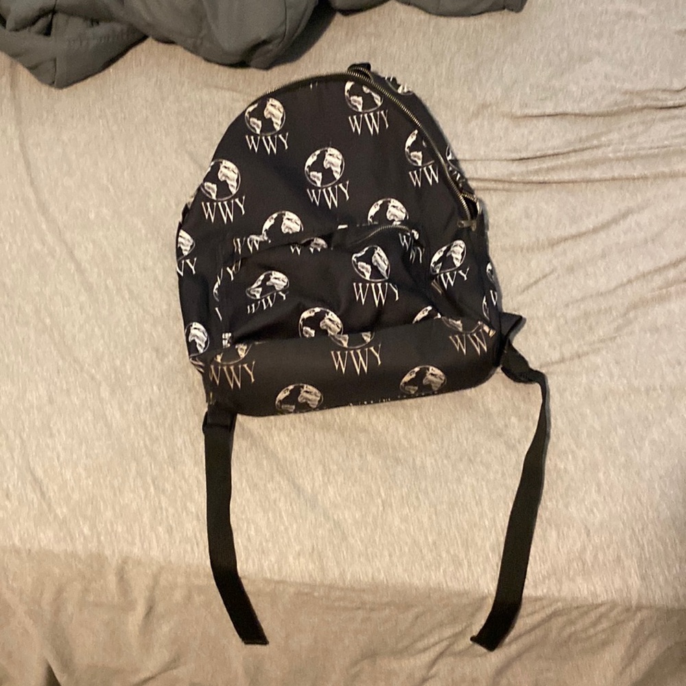 World Wide Youth, backpack, black and white